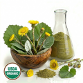 Colts Foot leaves and flowers in a wooden bowl, and a glass flash with green powder on a white background, featuring an USDA Organic label.