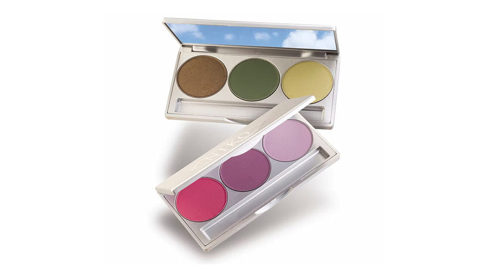 Makeup palette with colorful shades on a white background